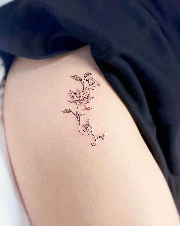 Lotus tattoo for music lovers by @yeowool_tattooer