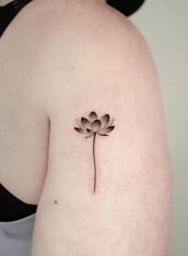 Small lotus tattoo by @frommay_tat