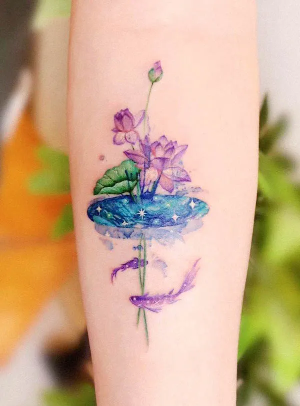 Koi fish and lotus tattoo by @peria_tattoo