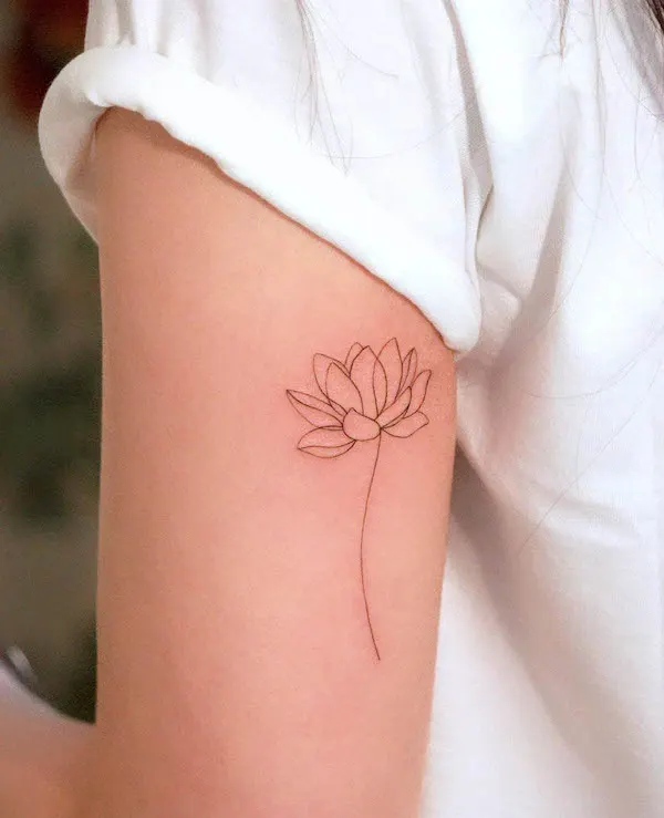 Simple fine line lotus tattoo by @won_tattooer