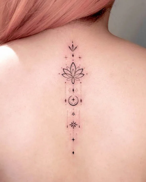 Small symbols and lotus tattoo by @ink_billow