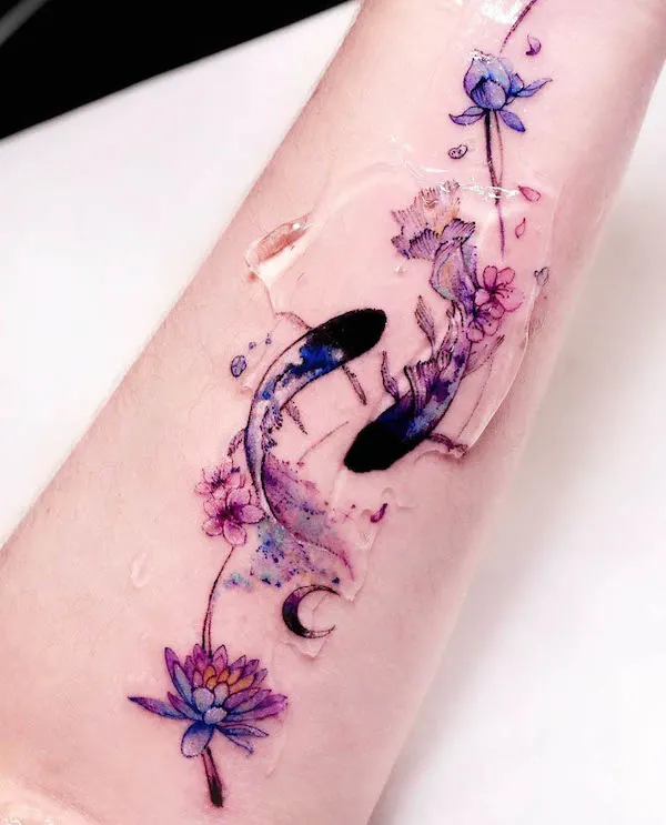 Koi fish and lotus tattoo by @seolheetattoo