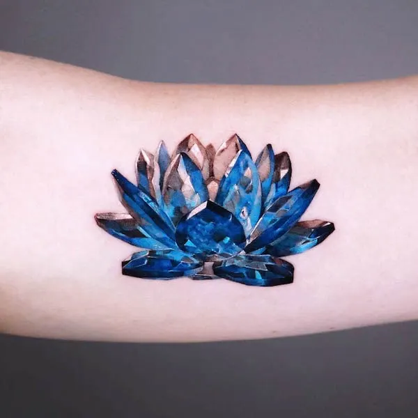 Crystal lotus tattoo by @tattooist_coldy