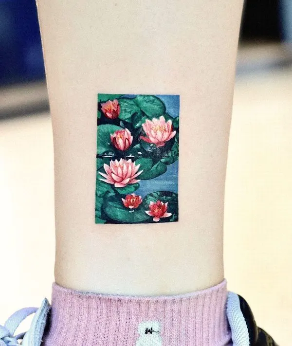 Lotus painting tattoo by @tattooist_mul