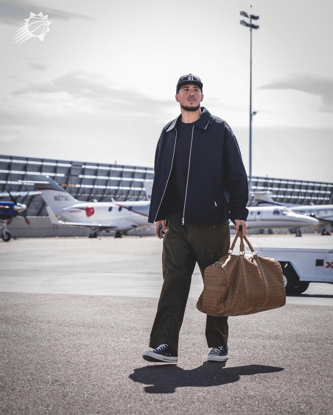 Devin Booker shows off his simple fashion choices.