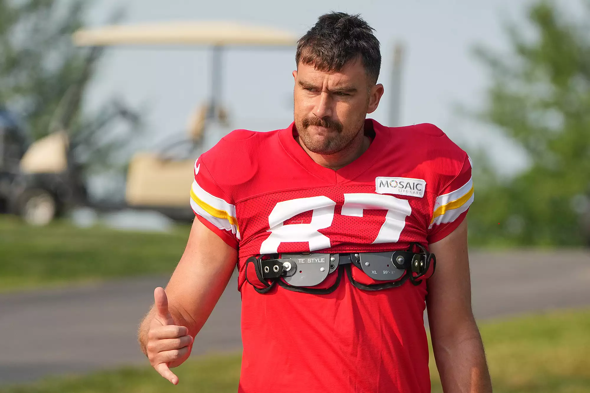 Kansas City Chiefs tight end Travis Kelce (87) waves to fans as he walks down the hill from the locker room to the fields prior to training camp at Missouri Western State University.