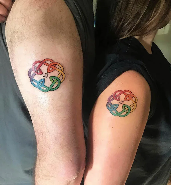 Rainbow color Celtic knots father daughter tattoos by @kendra_lea