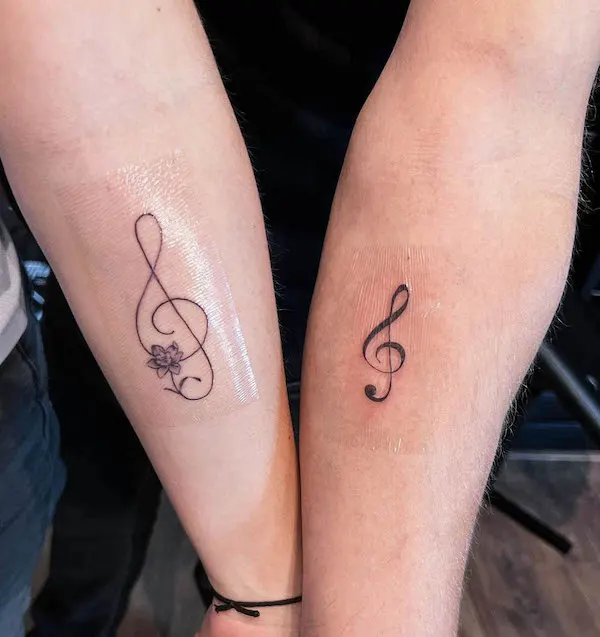 Musical note tattoos by @miss_monroe_tattooshop