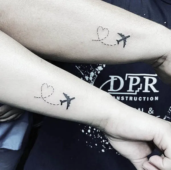 Plane tattoos on the wrist by @inkd_by_t