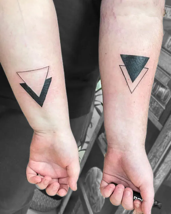 Father daughter triangular tattoos by @angibarr_skinsmithstattoos