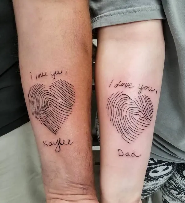 Fingerprint heart shapes for father and daughter tattoo by @spud_tattoo13