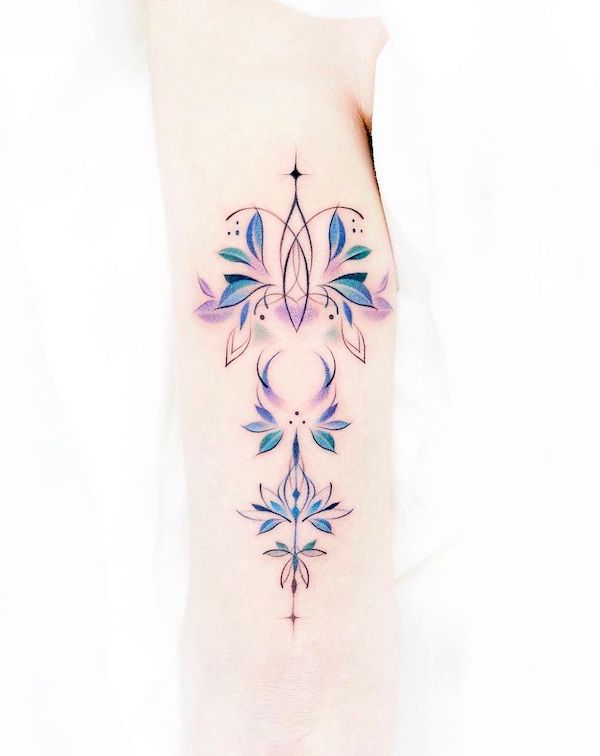 Symbolic flower tattoo by @foret_tattoo