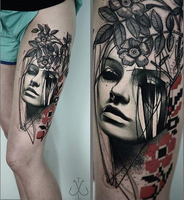 portrait and flower thigh tattoo