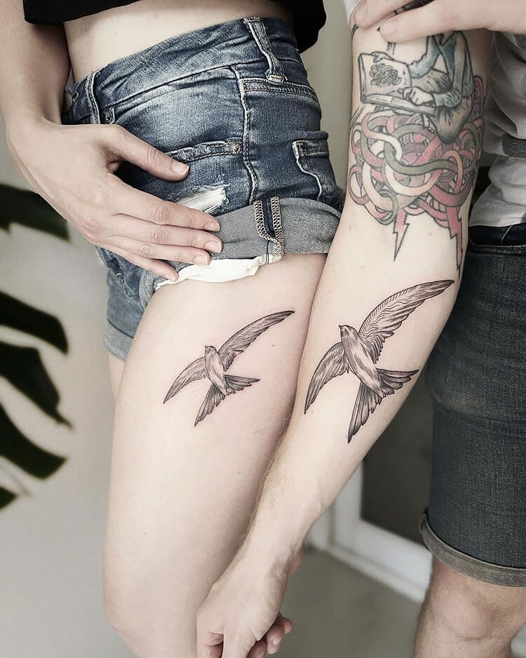 matching swallow bird tattoos