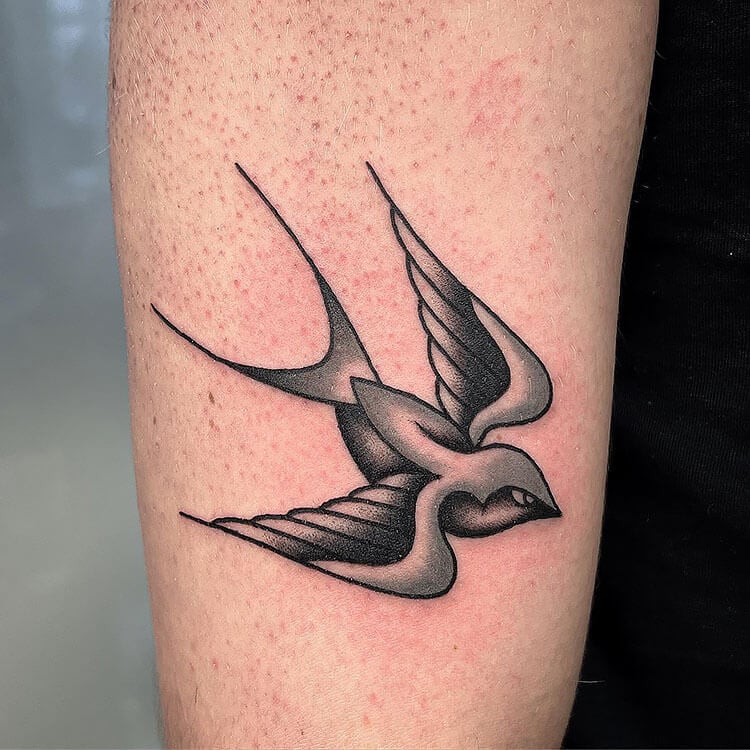 single swallow bird tattoo