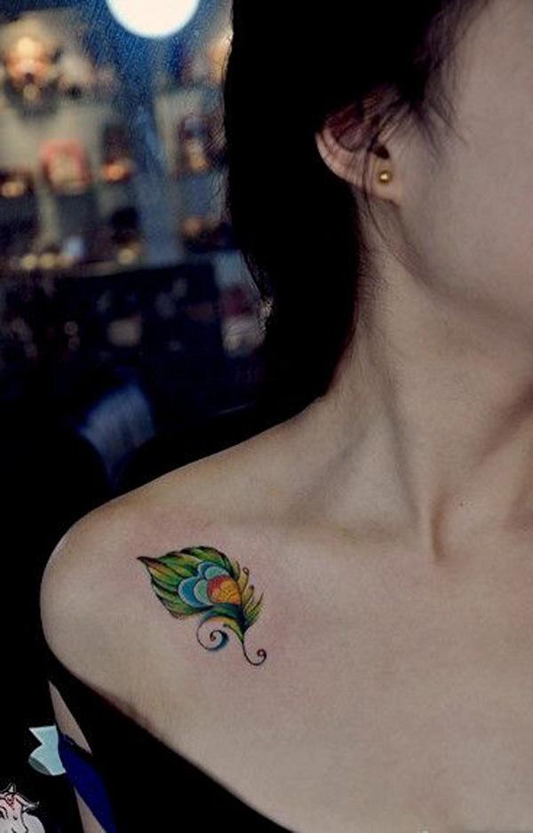 Peacock clavicle tattoo