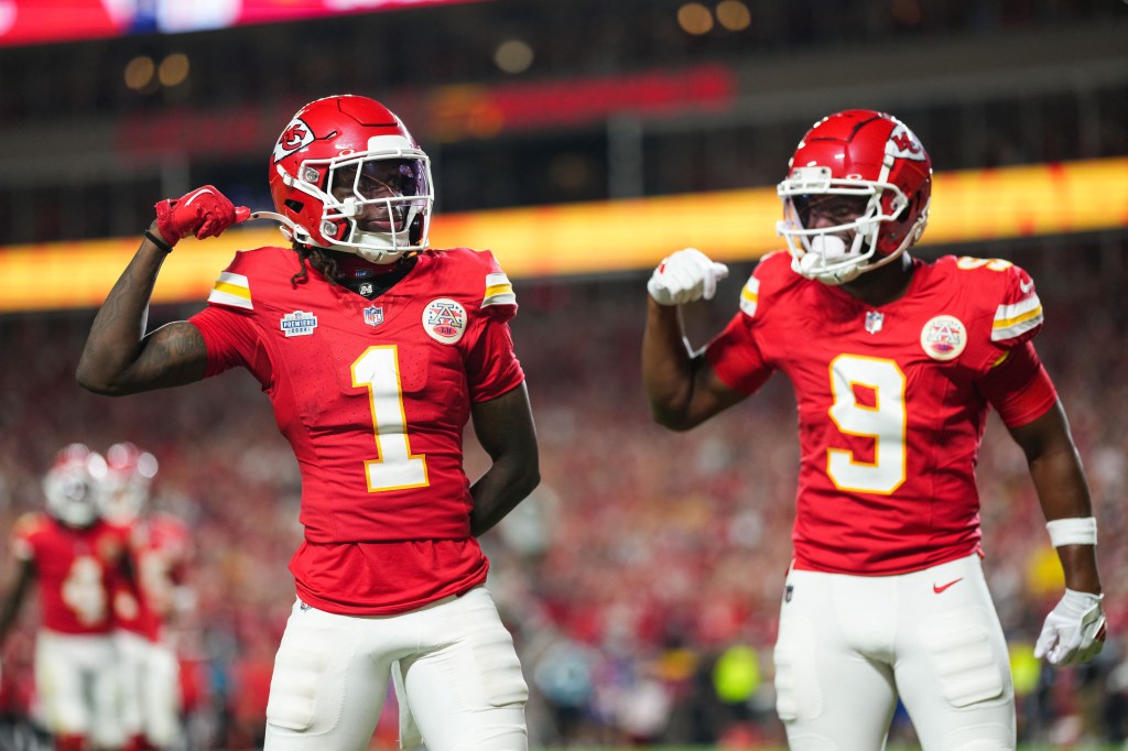 Kansas City Chiefs wide receiver Xavier Worthy (1) celebrates with wide receiver JuJu Smith-Schuster (9) after scoring a touchdown during the second half against the Baltimore Ravens at GEHA Field at Arrowhead Stadium on Sept. 5, 2024.