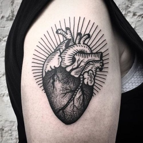 Discover Top 20 Black Heart Tattoo Designs for 2024: Symbolism &#038; Style in Ink