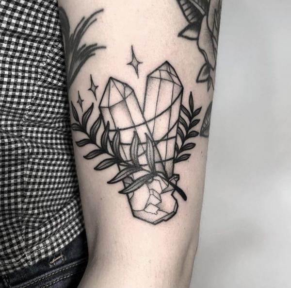 Black and white crystal with fern and star tattoo