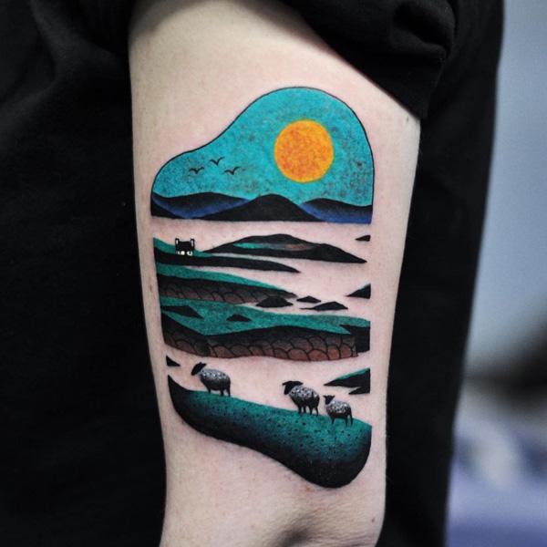 Colored idyllic sleeve tattoo