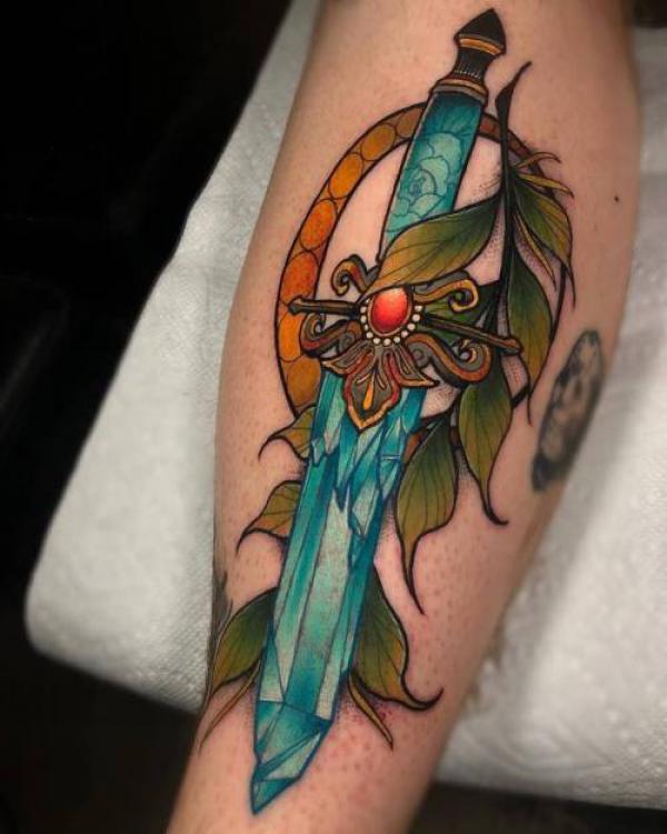 Crystal dagger with diamond tattoo