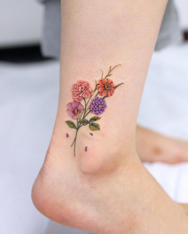 Dahlia orchid daisy and hydrangea tattoo on ankle