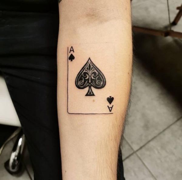 Forearm ace of spades tattoo