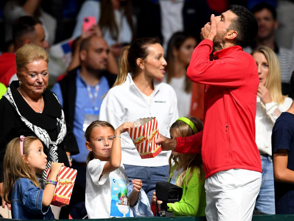 Novak India Fans on X: "🇷🇸 Novak Djokovic won his Davis Cup match 6-0,  6-1 in just 45 minutes and then had popcorn  with his daughter court side   https://t.co/fMMN3vrLDD" / X