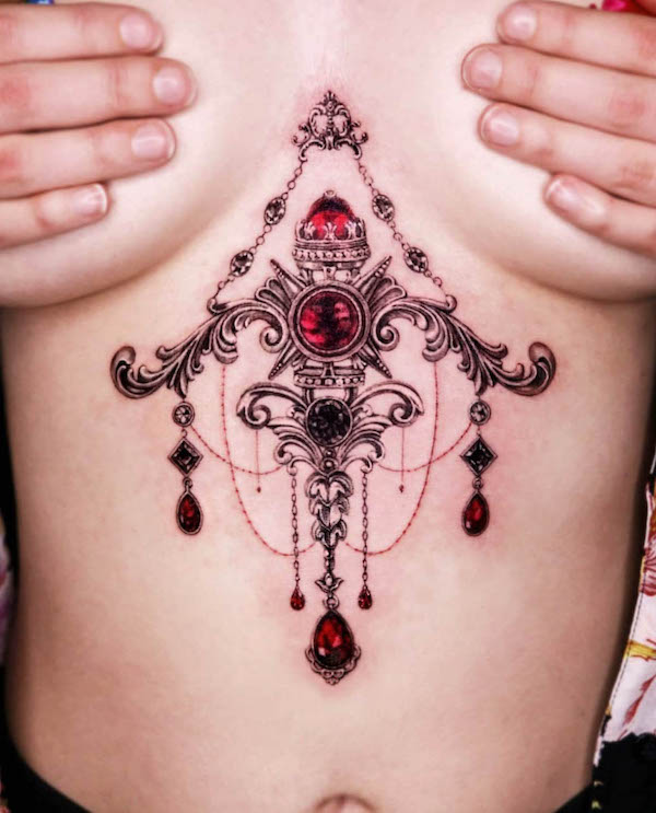 Gorgeous gem sternum tattoo by @the.hancock.effect