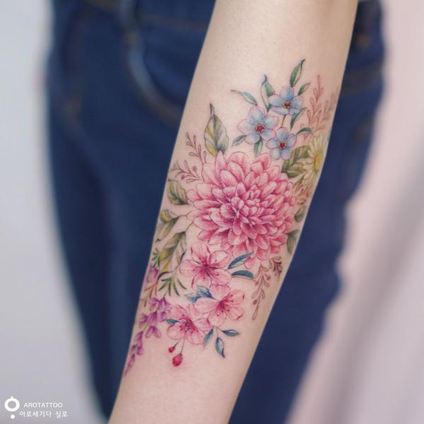 Pink dahlia tattoo