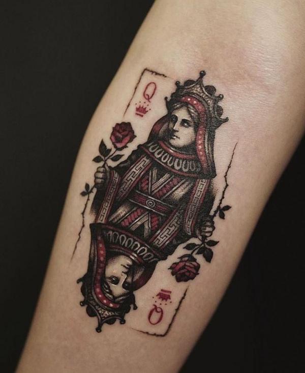 Queen playing card tattoo forearm