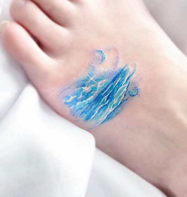 Realism wave foot tattoo by @default_blue_tt