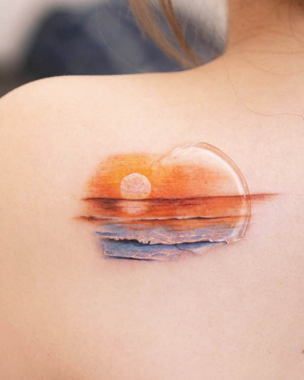 Tranquil sunset ocean tattoo by @woorin_tattoo