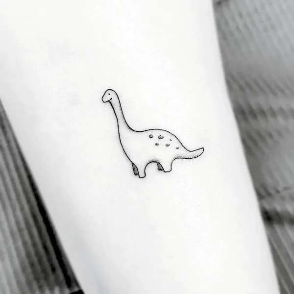 Simple small dinosaur tattoo by @tattoosbyina