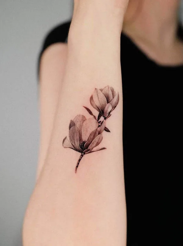 Black and grey forearm flower tattoo by @frommay_t