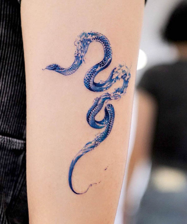 Wave snake by @tattooist.inno