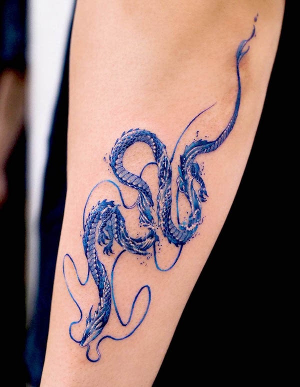 Water dragon arm tattoo by @tattooist.inno