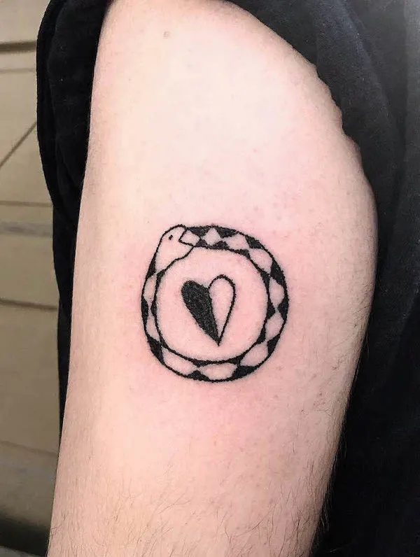 Ouroboros and heart tattoo by @holyghost__