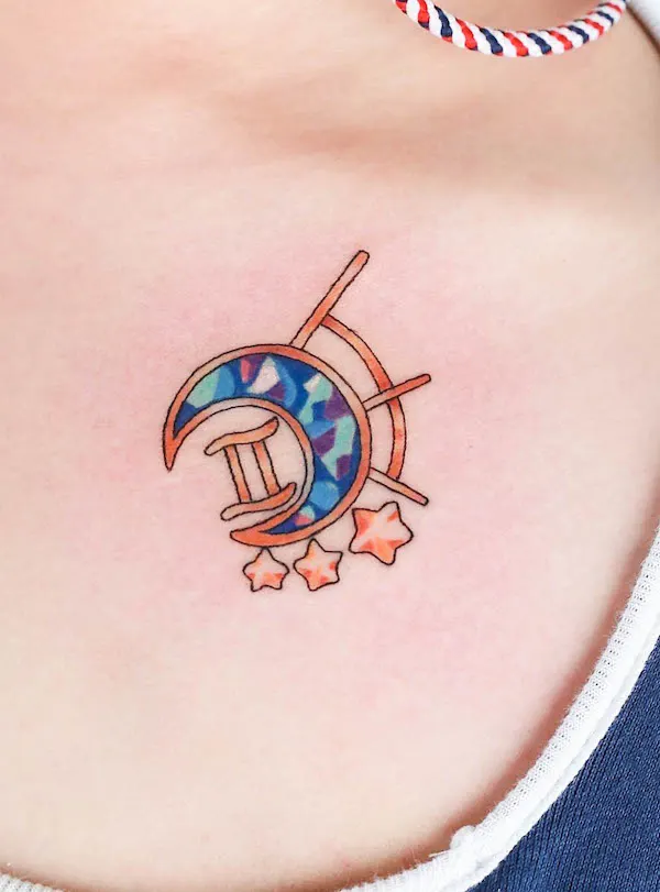 Small gemstone and Gemini glyph tattoo by @log_tattoo