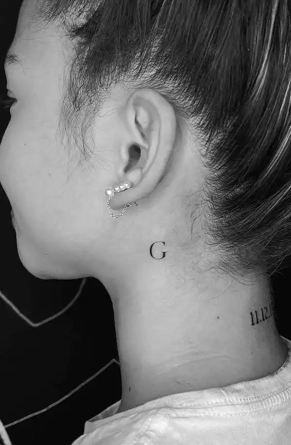 Small G initial tattoo by @ayalatattoo1