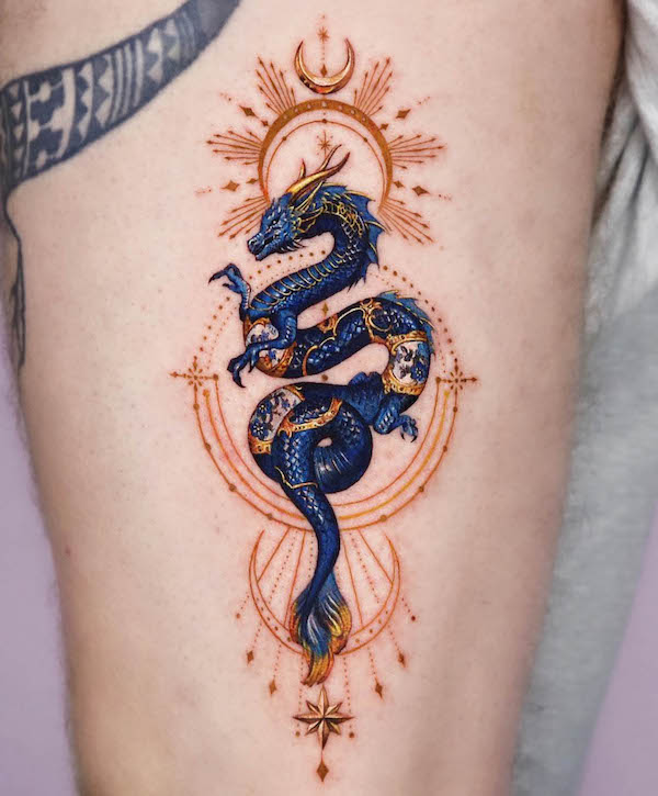 Intricate blue dragon tattoo by @yeriel_tattoo