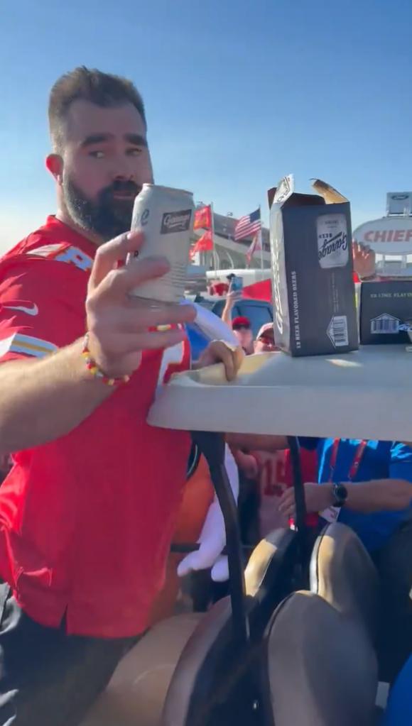 Jason Kelce passes out beers on the back of a golf cart ahead of the Chiefs Week 5 matchup against the Saints.