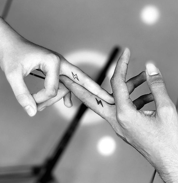 Small lightning finger tattoos by @hemalbarot01