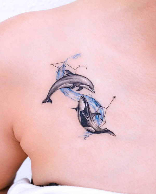 Whale and dolphin zodiac chest tattoo by @tattooist_yun