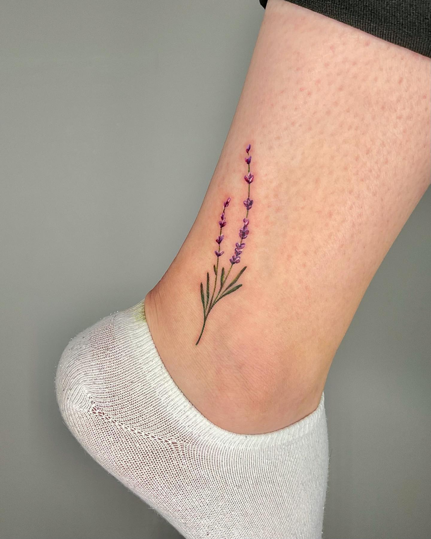 Lavender tattoo located on the ankle