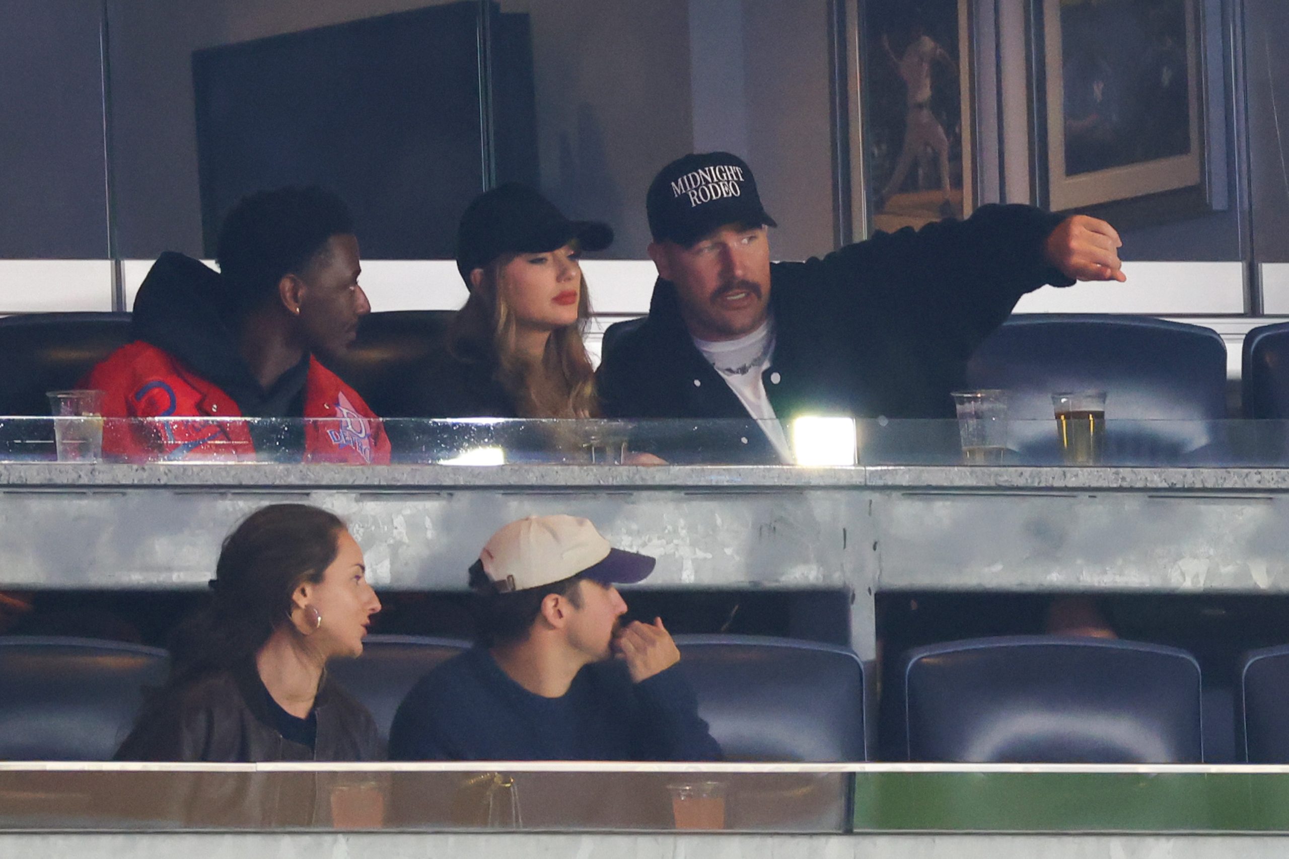 Taylor Swift and Travis Kelce at an MLB Playoff game in New York on Oct. 14, 2024