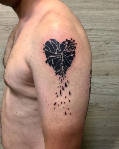 Discover Top 20 Black Heart Tattoo Designs for 2024: Symbolism &#038; Style in Ink