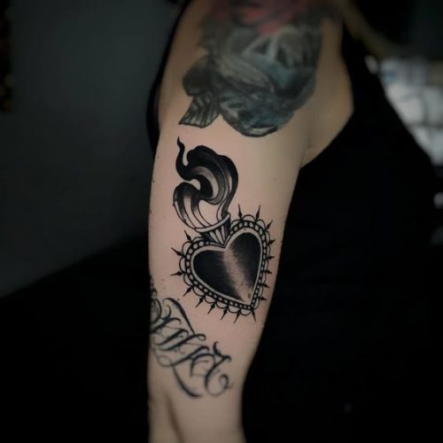 Discover Top 20 Black Heart Tattoo Designs for 2024: Symbolism &#038; Style in Ink