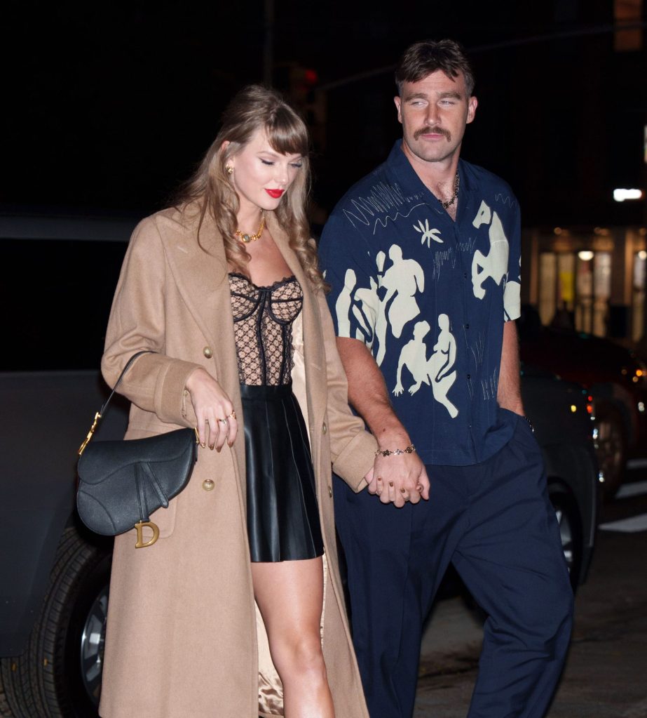 Taylor Swift and Travis Kelce walking together in New York City on October 11, 2024