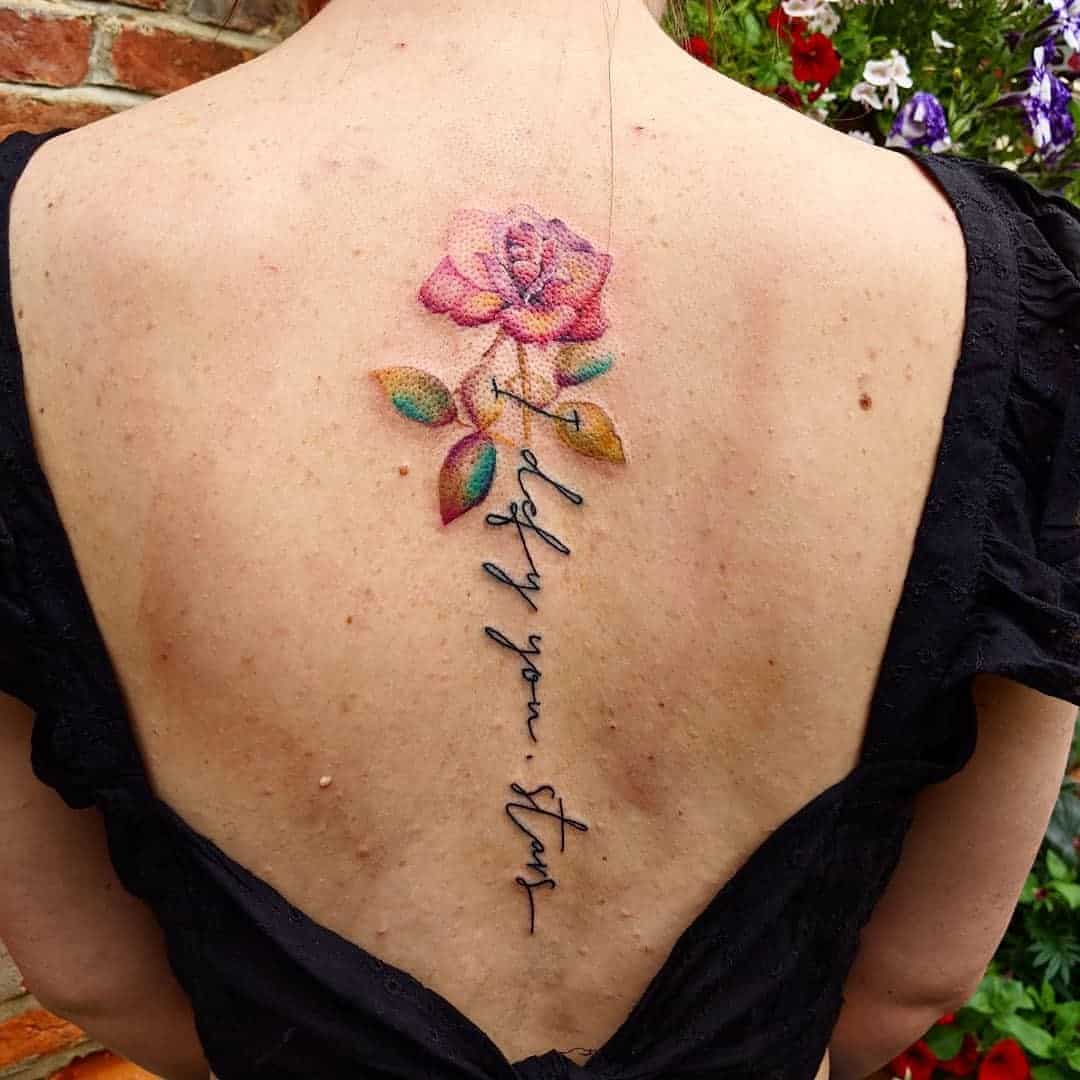 Bright Colorful Flower Spine Tattoo